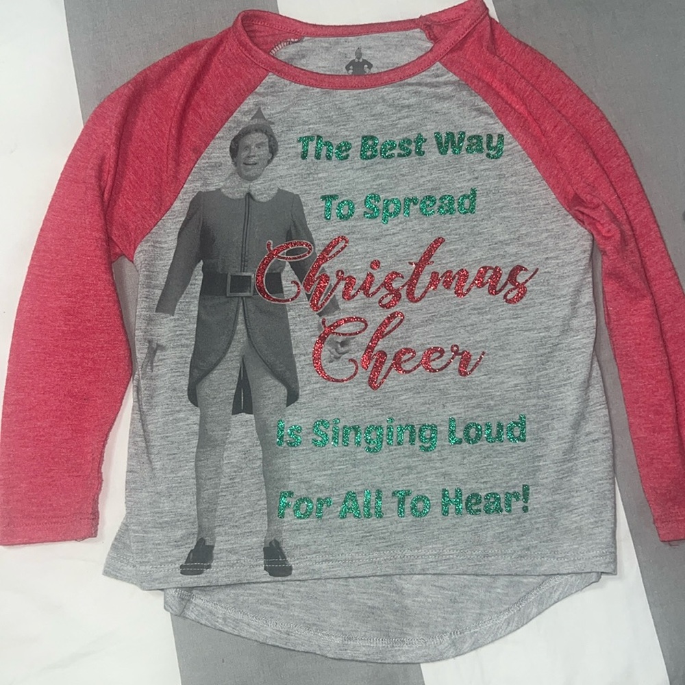 Celebrate holiday cheer in an Elf Christmas long sleeved tshirt, size 4-5